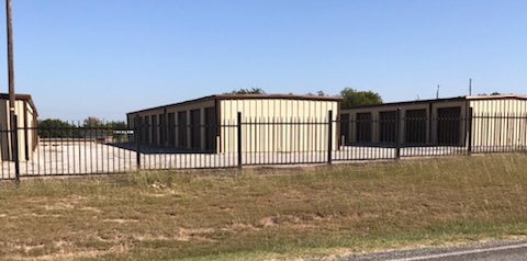 Gated self-storage with roll-up doors in Van Alstyne, Texas. Elite Storage #2